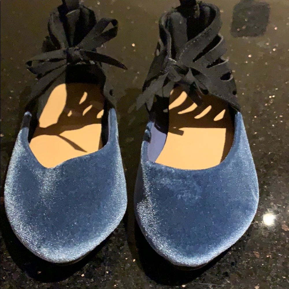Black and blue suede shoes